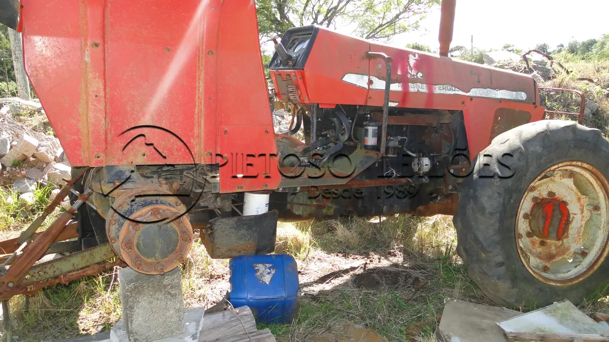 LOTE 011 - TRATOR MASSEY FERGUSSON 4X4.