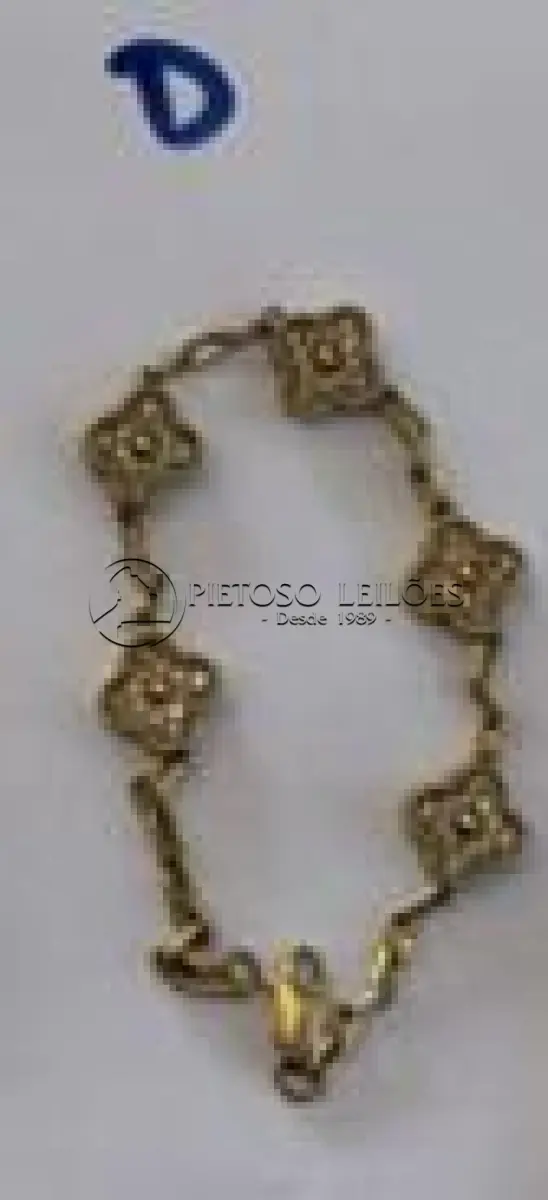 LOTE 140 - PULSEIRA FEMININA EM OURO COM TREVOS