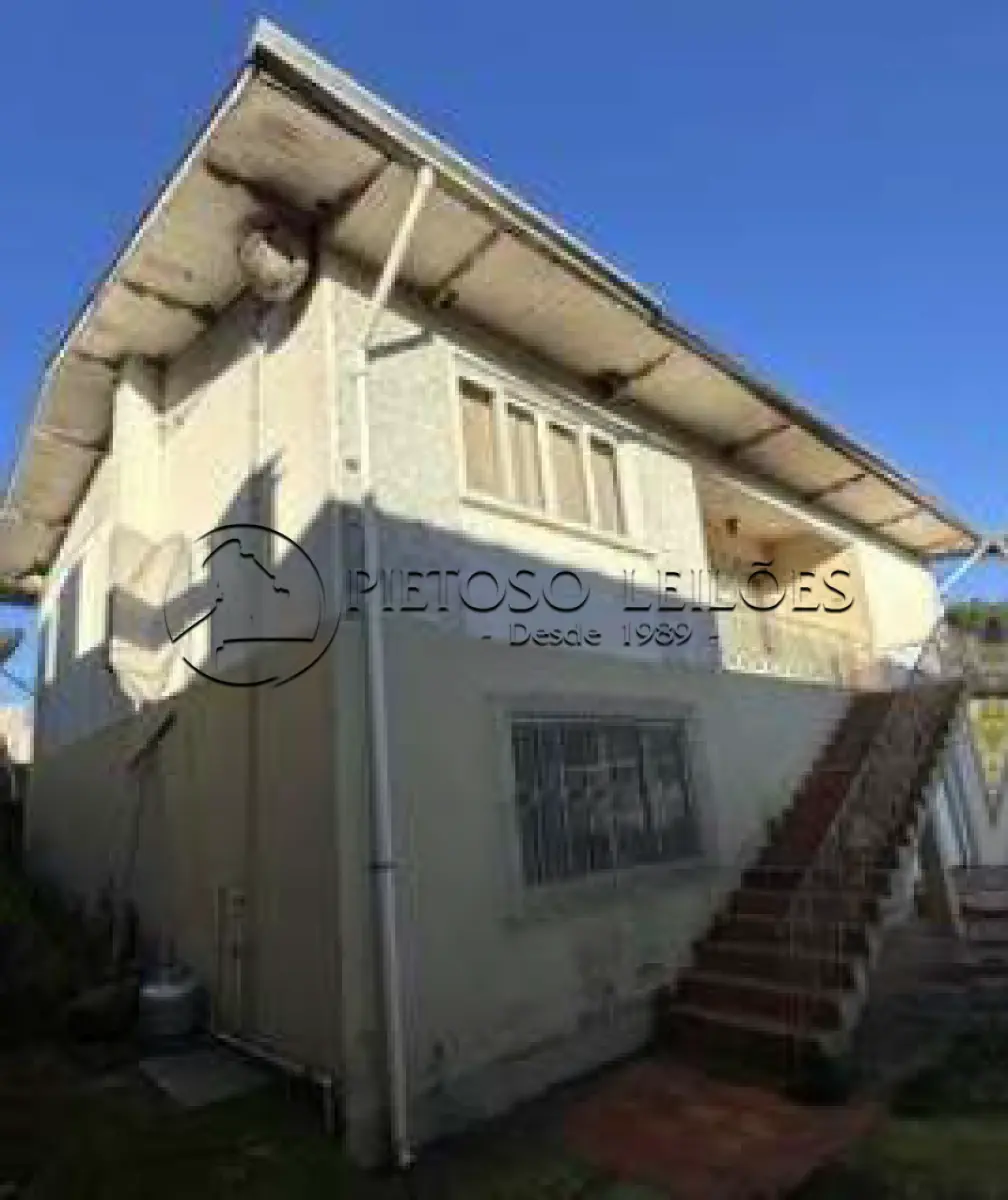 LOTE 100 - FLORES DA CUNHA/RS - FRAÇÃO IDEAL DE 244,00M² - CASA DE ALVENARIA COM 2 PAVIMENTOS - TRAVESSÃO ESMERALDA